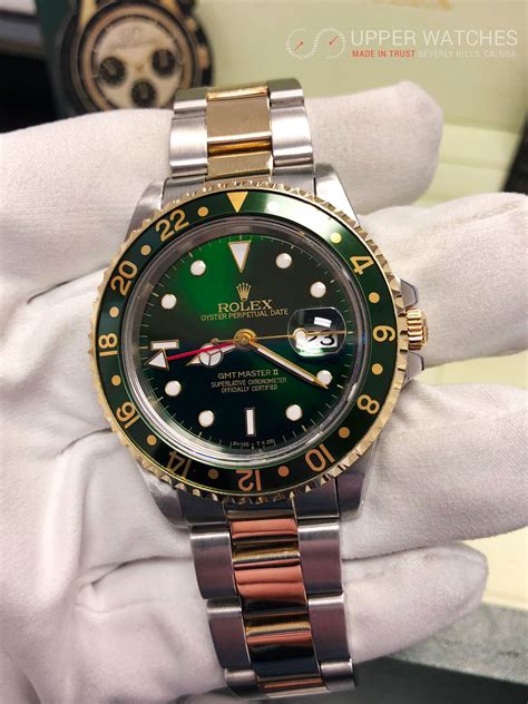 rolex gmt green face gold|Rolex gmt black and gray.